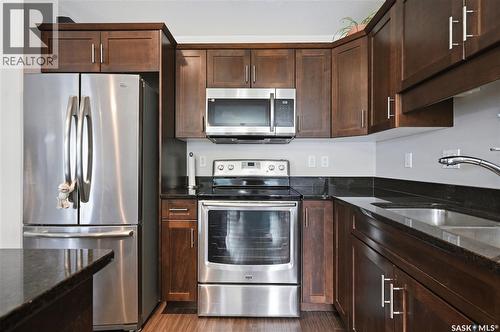 14 502 Rempel Manor, Saskatoon, SK - Indoor Photo Showing Kitchen With Stainless Steel Kitchen