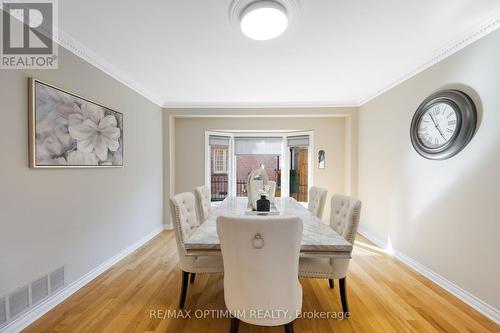 Elegant formal dining with bay window - 5859 Riverside Place, Mississauga, ON - Indoor Photo Showing Dining Room