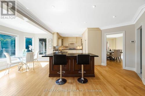 Chef's kitchen with granite centre island - 5859 Riverside Place, Mississauga, ON - Indoor Photo Showing Dining Room