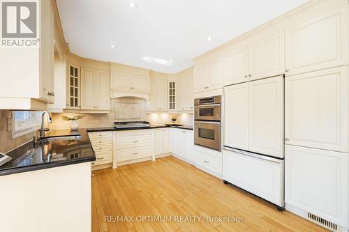 Classic cream cabinetry & Inbuilt oven - 5859 Riverside Place, Mississauga, ON - Indoor Photo Showing Kitchen
