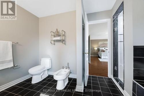 Ensuite with glass shower & bidet - 5859 Riverside Place, Mississauga, ON - Indoor Photo Showing Bathroom