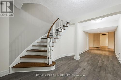 Finished basement with elegant staircase - 5859 Riverside Place, Mississauga, ON - Indoor Photo Showing Other Room