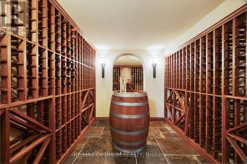 Impressive temperature-controlled wine cellar - 5859 Riverside Place, Mississauga, ON - Indoor Photo Showing Other Room