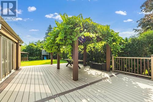 Grapevine-covered pergola & composite deck - 5859 Riverside Place, Mississauga, ON - Outdoor With Deck Patio Veranda With Exterior