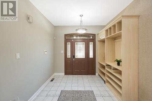 Bright foyer with custom built-in organizers - 5859 Riverside Place, Mississauga, ON - Indoor Photo Showing Other Room