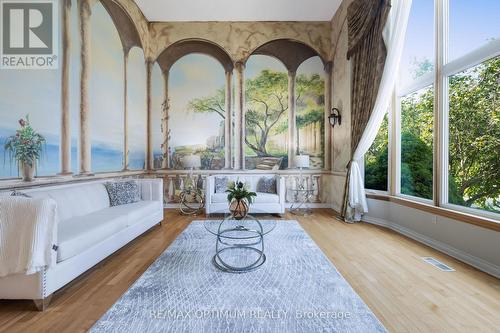 Sun-filled formal living with soaring windows - 5859 Riverside Place, Mississauga, ON - Indoor Photo Showing Other Room