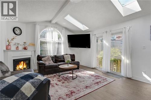 100 Anglerock Drive, Cambridge, ON - Indoor Photo Showing Living Room With Fireplace