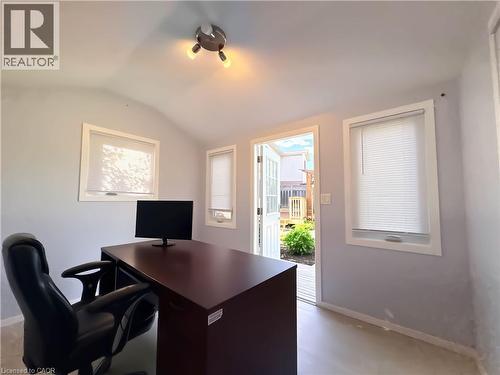 Bright interior space featuring light gray walls and a vaulted ceiling - 33 Remple Court, Cambridge, ON - Indoor Photo Showing Office