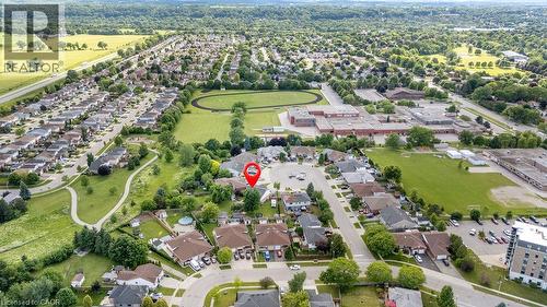 Aerial perspective showcasing a residential neighborhood with ample green space - 33 Remple Court, Cambridge, ON - Outdoor With View