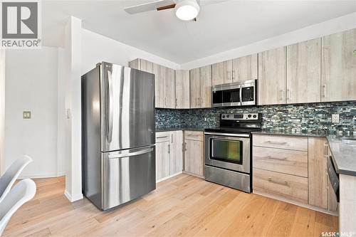 1408 B Avenue N, Saskatoon, SK - Indoor Photo Showing Kitchen With Stainless Steel Kitchen