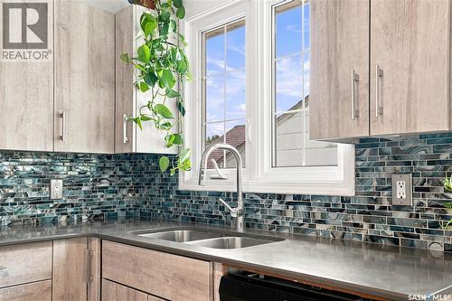 1408 B Avenue N, Saskatoon, SK - Indoor Photo Showing Kitchen With Double Sink