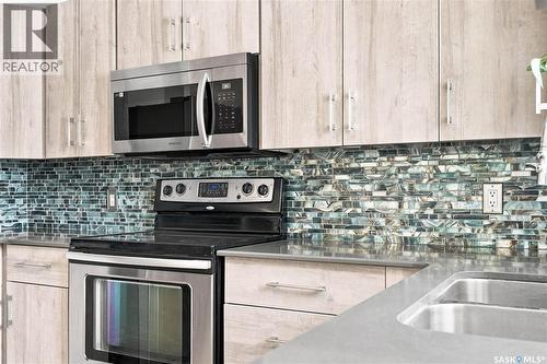 1408 B Avenue N, Saskatoon, SK - Indoor Photo Showing Kitchen With Stainless Steel Kitchen With Double Sink