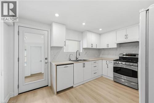 1062 Cannon Street E, Hamilton, ON - Indoor Photo Showing Kitchen With Double Sink