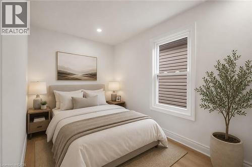 VIRTUALLY STAGED - 1062 Cannon Street E, Hamilton, ON - Indoor Photo Showing Bedroom