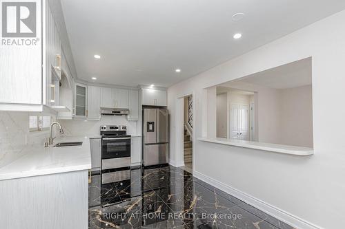 5154 New Street, Burlington, ON - Indoor Photo Showing Kitchen With Double Sink With Upgraded Kitchen