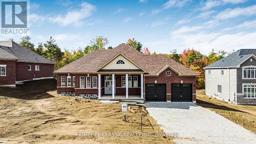 74 Ruby Ridge, Oro-Medonte, ON - Outdoor With Facade