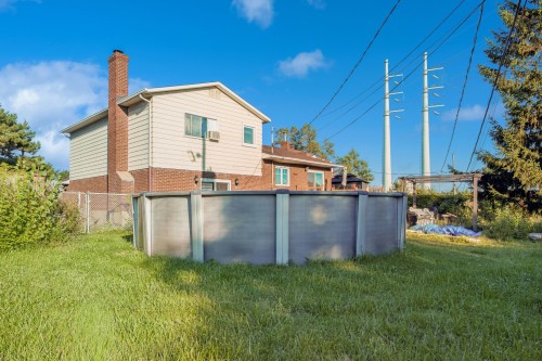 Cour - 6560 Rue Villon, Brossard, QC - Outdoor With Above Ground Pool