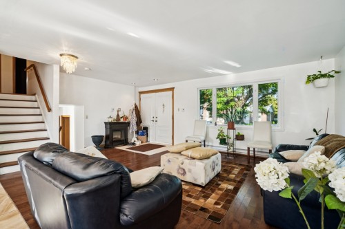 Salon - 6560 Rue Villon, Brossard, QC - Indoor Photo Showing Living Room With Fireplace