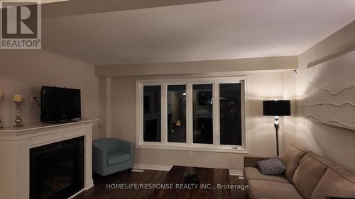 4451 Eclipse Way, Niagara Falls, ON - Indoor Photo Showing Living Room With Fireplace