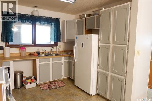 235 King Street, Coronach, SK - Indoor Photo Showing Kitchen With Double Sink