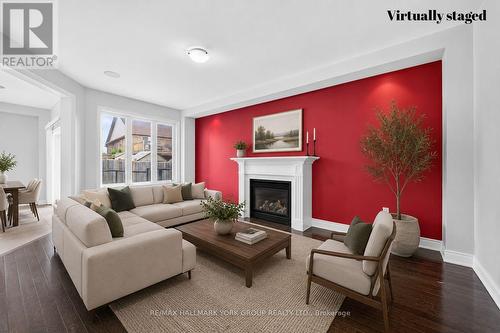 2094 Webster Blvd | Living room Virtually Staged - 2094 Webster Boulevard, Innisfil, ON - Indoor Photo Showing Living Room With Fireplace