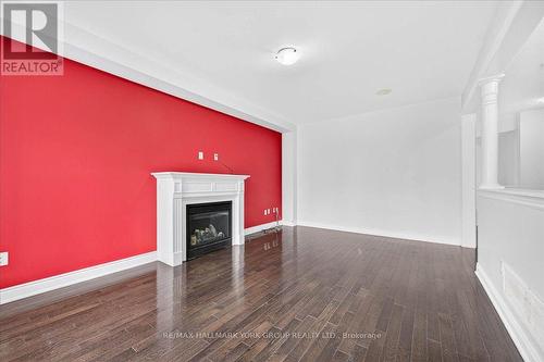 2094 Webster Blvd | Living room Hardwood floors - 2094 Webster Boulevard, Innisfil, ON - Indoor With Fireplace