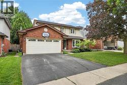 Brick and siding exterior with a two-car garage - 