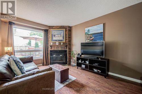 8 Closs Square, Aurora, ON - Indoor Photo Showing Living Room With Fireplace