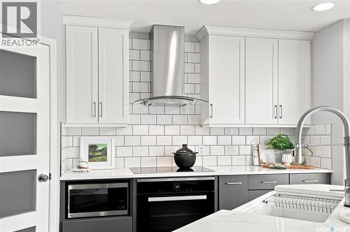 311 Lashyn Cove, Saskatoon, SK - Indoor Photo Showing Kitchen With Upgraded Kitchen