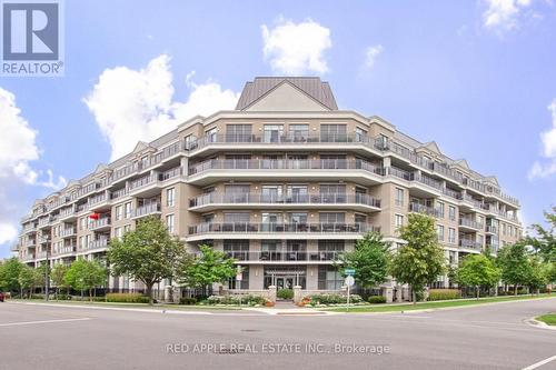 519 - 111 Civic Square Gate, Aurora, ON - Outdoor With Balcony With Facade