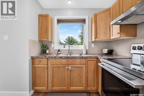 951 Holdsworth Crescent, Moose Jaw, SK - Indoor Photo Showing Kitchen With Double Sink