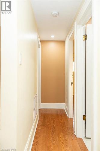 Hardwood flooring, recessed lighting, and crisp white trim - 41 Paradise Road S, Hamilton, ON - Indoor Photo Showing Other Room