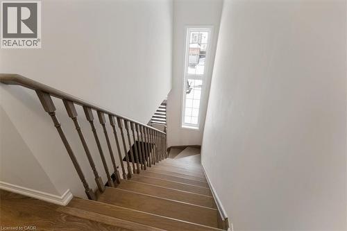 Stairway with wood finished floors - 13 Steven Drive, Thorold, ON - Indoor Photo Showing Other Room