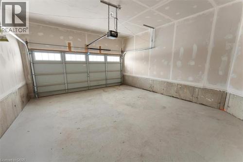 Garage with a garage door opener - 13 Steven Drive, Thorold, ON - Indoor Photo Showing Garage