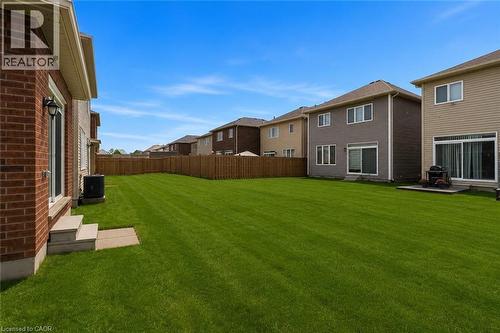 Expansive lawn area enclosed by a wood privacy fence - 13 Steven Drive, Thorold, ON - Outdoor