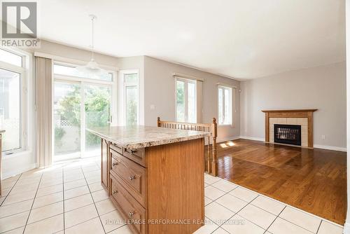 Kitchen eating area with walk-out - 127 Finn Court, Ottawa, ON - Indoor With Fireplace