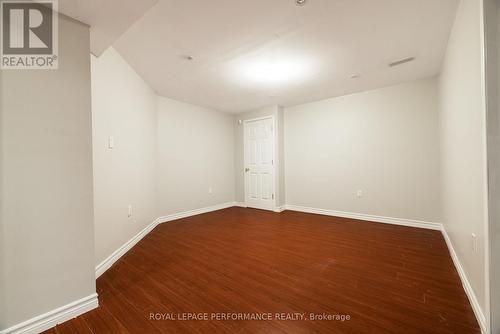 Basement Rec Room w/ door to den - 127 Finn Court, Ottawa, ON - Indoor Photo Showing Other Room
