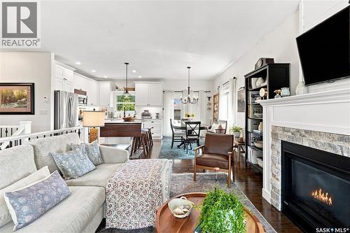 621 Braun Lane, Warman, SK - Indoor Photo Showing Living Room With Fireplace