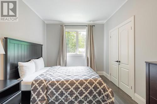 7 Duquette Court, Tiny, ON - Indoor Photo Showing Bedroom