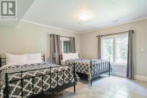 7 Duquette Court, Tiny, ON - Indoor Photo Showing Bedroom