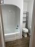Tub and shower combination with chrome fixtures - 49 West Avenue, Kitchener, ON  - Indoor Photo Showing Bathroom 