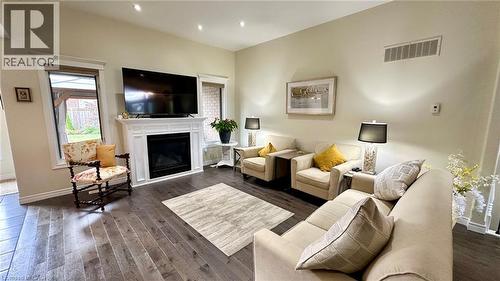 66 Driftwood Drive, Simcoe, ON - Indoor Photo Showing Living Room With Fireplace