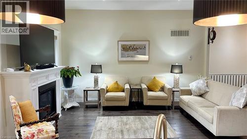 66 Driftwood Drive, Simcoe, ON - Indoor Photo Showing Living Room With Fireplace
