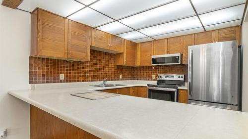 303-1075 Bernard Avenue, Kelowna, BC - Indoor Photo Showing Kitchen With Upgraded Kitchen