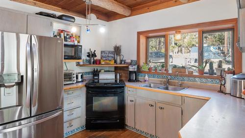 15-7080 Glenfir Road, Naramata, BC - Indoor Photo Showing Kitchen With Double Sink