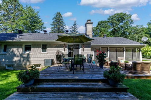 Face arrière - 95 Rue Maple, Hudson, QC - Outdoor With Deck Patio Veranda