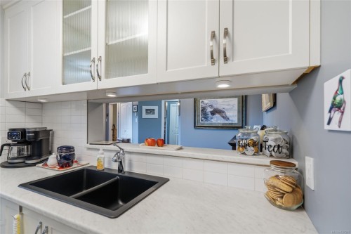 #207-4971 Songbird Pl, Nanaimo, BC - Indoor Photo Showing Kitchen With Double Sink