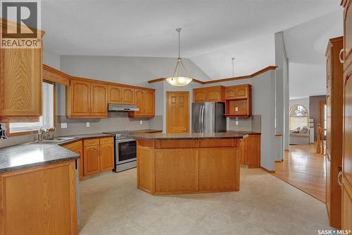3210 Peyson Bay E, Regina, SK - Indoor Photo Showing Kitchen With Double Sink