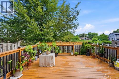 Wood-tone deck with wood railings and lattice fence accents - 145 Rice Avenue Unit# 2, Hamilton, ON - Outdoor With Deck Patio Veranda With Exterior