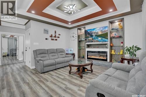 3204 Crosbie Crescent, Regina, SK - Indoor Photo Showing Living Room With Fireplace